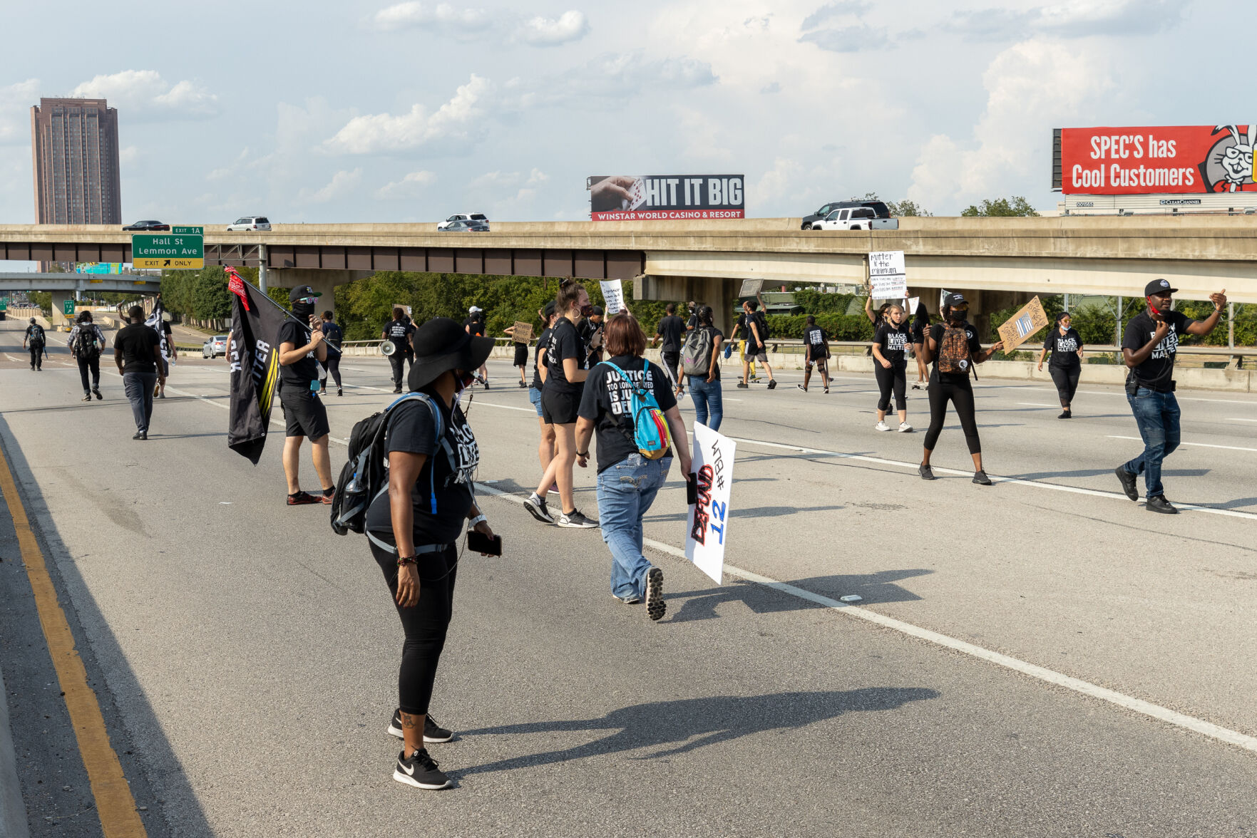 Photos: Protesters march down U.S. 75, chant outside home of Dallas mayor to call for racial justice